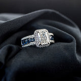 Blue sapphire and diamond engagement ring in 14K white gold