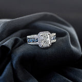 Radiant-cut lab-grown diamond engagement ring with diamond halo and sapphire band